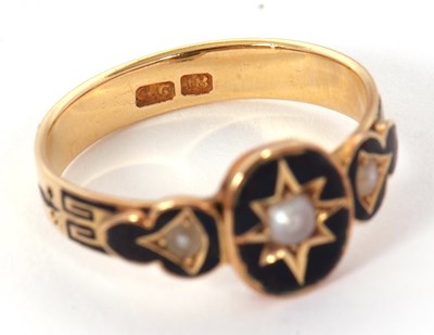 Lot 54 - A 19th century mourning ring, the central oval...
