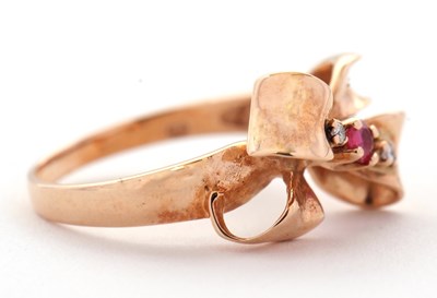 Lot 74 - A 14ct ruby and diamond bow ring, the bow set...