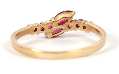 Lot 59 - A 9ct ruby ring, set with two overlapping...