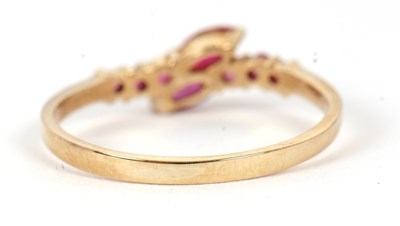 Lot 59 - A 9ct ruby ring, set with two overlapping...