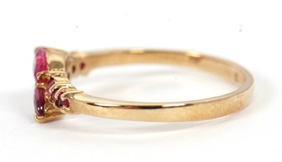 Lot 59 - A 9ct ruby ring, set with two overlapping...