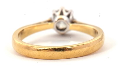 Lot 73 - An 18ct diamond solitaire ring, the round...