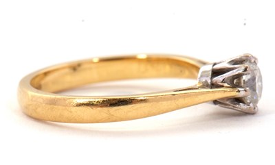 Lot 73 - An 18ct diamond solitaire ring, the round...