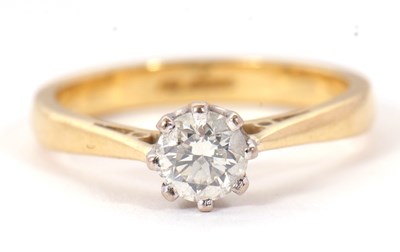Lot 73 - An 18ct diamond solitaire ring, the round...