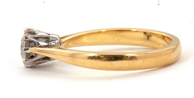 Lot 73 - An 18ct diamond solitaire ring, the round...