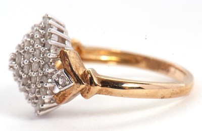 Lot 13 - A 9ct diamond cluster ring, the tiered cluster...