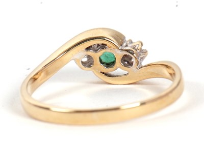 Lot 80 - A 9ct emerald and diamond ring, the round...