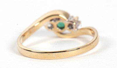 Lot 80 - A 9ct emerald and diamond ring, the round...
