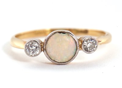 Lot 81 - An opal and diamond ring, the round opal...