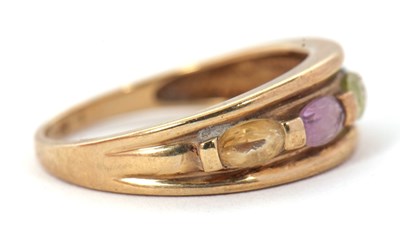 Lot 77 - A 9ct multi gemset ring, with topaz, peridot,...