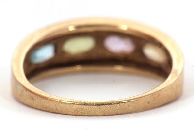 Lot 77 - A 9ct multi gemset ring, with topaz, peridot,...