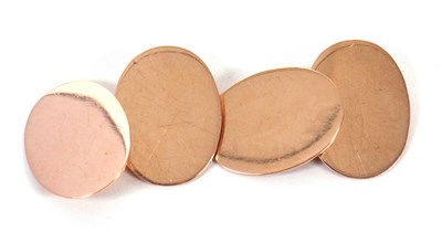 Lot 301 - A pair of 9ct rose gold oval cufflinks, the...
