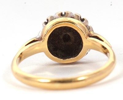 Lot 65 - A sapphire and diamond cluster ring, the...