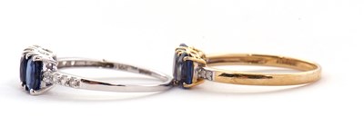 Lot 82 - Two 9ct kyanite rings: one set with three oval...
