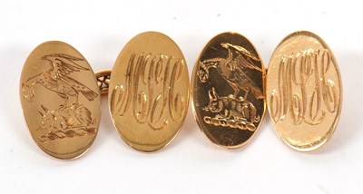 Lot 281 - A pair of 18ct cufflinks, the oval discs with...
