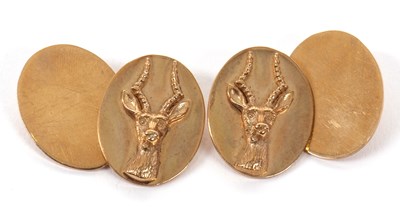 Lot 283 - A pair of 9ct cufflinks, the oval discs with...