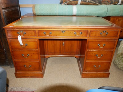 Lot 620 - A reproduction yew wood veneered twin pedestal...