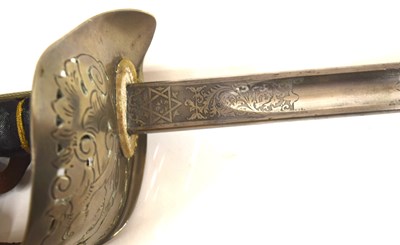 Lot 180 - GRV 1897 pattern Officers sword with Leather...