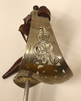 Lot 180 - GRV 1897 pattern Officers sword with Leather...
