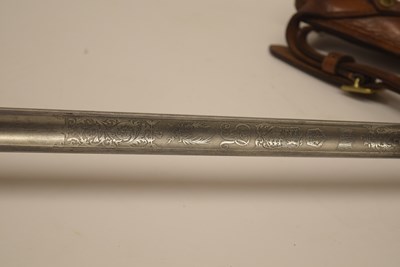 Lot 180 - GRV 1897 pattern Officers sword with Leather...