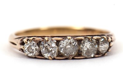 Lot 6 - A five stone diamond ring, the five graduated...