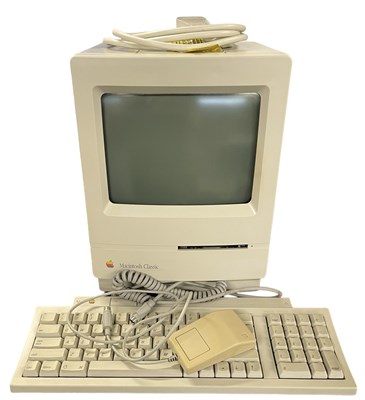 Lot 350 - An Apple Macintosh Classic with keyboard and...