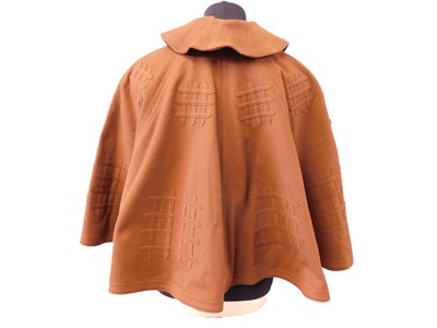 Lot 13 - An early 20th century lady's brown felt cape,...