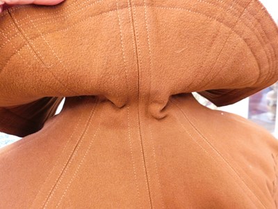 Lot 13 - An early 20th century lady's brown felt cape,...