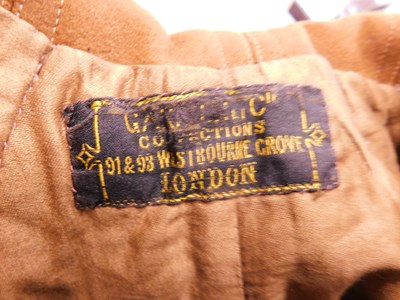 Lot 13 - An early 20th century lady's brown felt cape,...