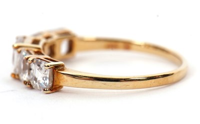Lot 1 - A 9ct white zircon ring, the five graduated...