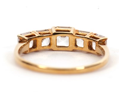Lot 1 - A 9ct white zircon ring, the five graduated...