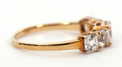 Lot 1 - A 9ct white zircon ring, the five graduated...