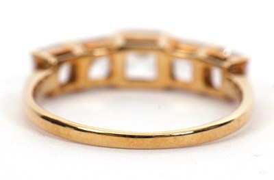 Lot 1 - A 9ct white zircon ring, the five graduated...