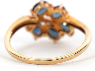Lot 7 - A 9ct blue stone and diamond ring, the leaf...