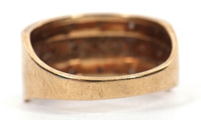 Lot 43 - A 9ct diamond ring, the upper half set with...