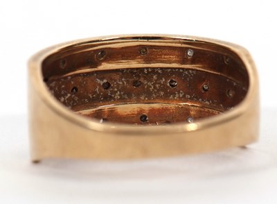 Lot 43 - A 9ct diamond ring, the upper half set with...