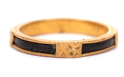 Lot 42 - A '916' gold ring, the rustic ring with dark...