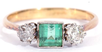 Lot 11 - Emerald and diamond three-stone ring, the...
