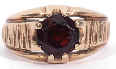 Lot 16 - 9ct gold garnet set signet ring, the round cut...
