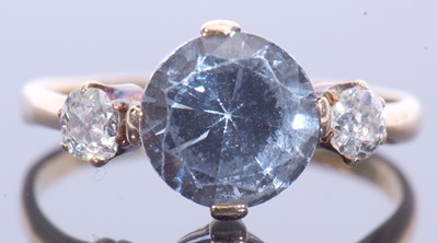 Lot 30 - 18ct gold blue topaz and diamond ring, the...