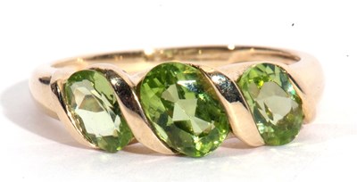 Lot 53 - Modern three green stone ring, stamped 9K,...