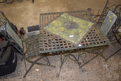 Lot 1108 - A metal cast garden bistro set, table and two...