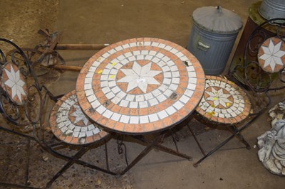 Lot 1109 - A metal cast garden bistro set, table and two...