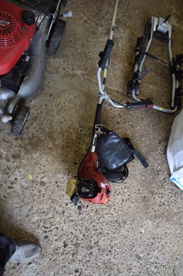 Lot 1114 - An Einhell petrol strimmer