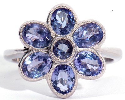 Lot 78 - 18ct white gold and tanzanite cluster ring, a...