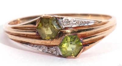 Lot 79 - Modern 9ct gold peridot and small diamond...