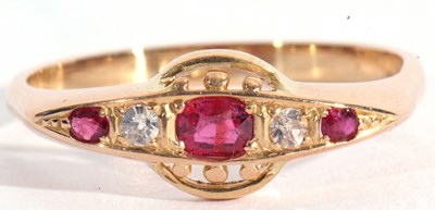 Lot 98 - Ruby and diamond ring, line set with three...