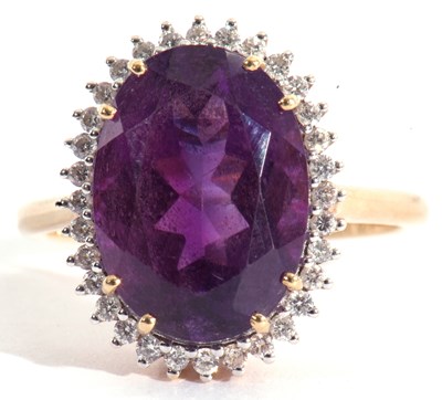 Lot 108 - Modern 18ct gold amethyst and diamond ring,...