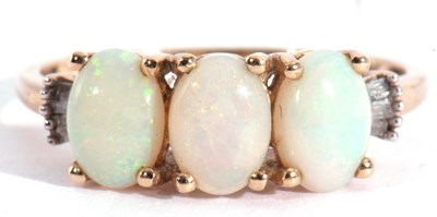 Lot 111 - Modern 9ct gold white opal three stone ring,...
