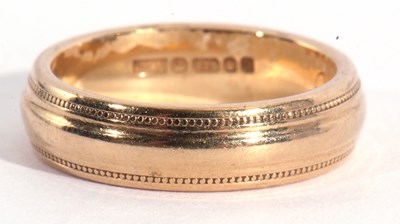 Lot 124 - 9ct gold wedding ring, the plain polished body...